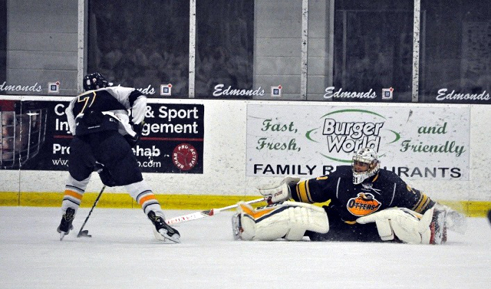 Otters goalie #31 Mitchell Jones makes the save