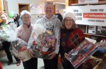 Door Prize winners (from left) Barb Saunders, former President of OCA (Ontario Curling Association) John Francis and HCC past president Doris Kelly Capyk