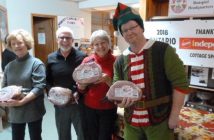 Second place Draw 2 All-Stars with ham prizes (from left) lead Jan Clark, second Bill Thomas, vice Sandra Heiydt and skip Darrell Harper