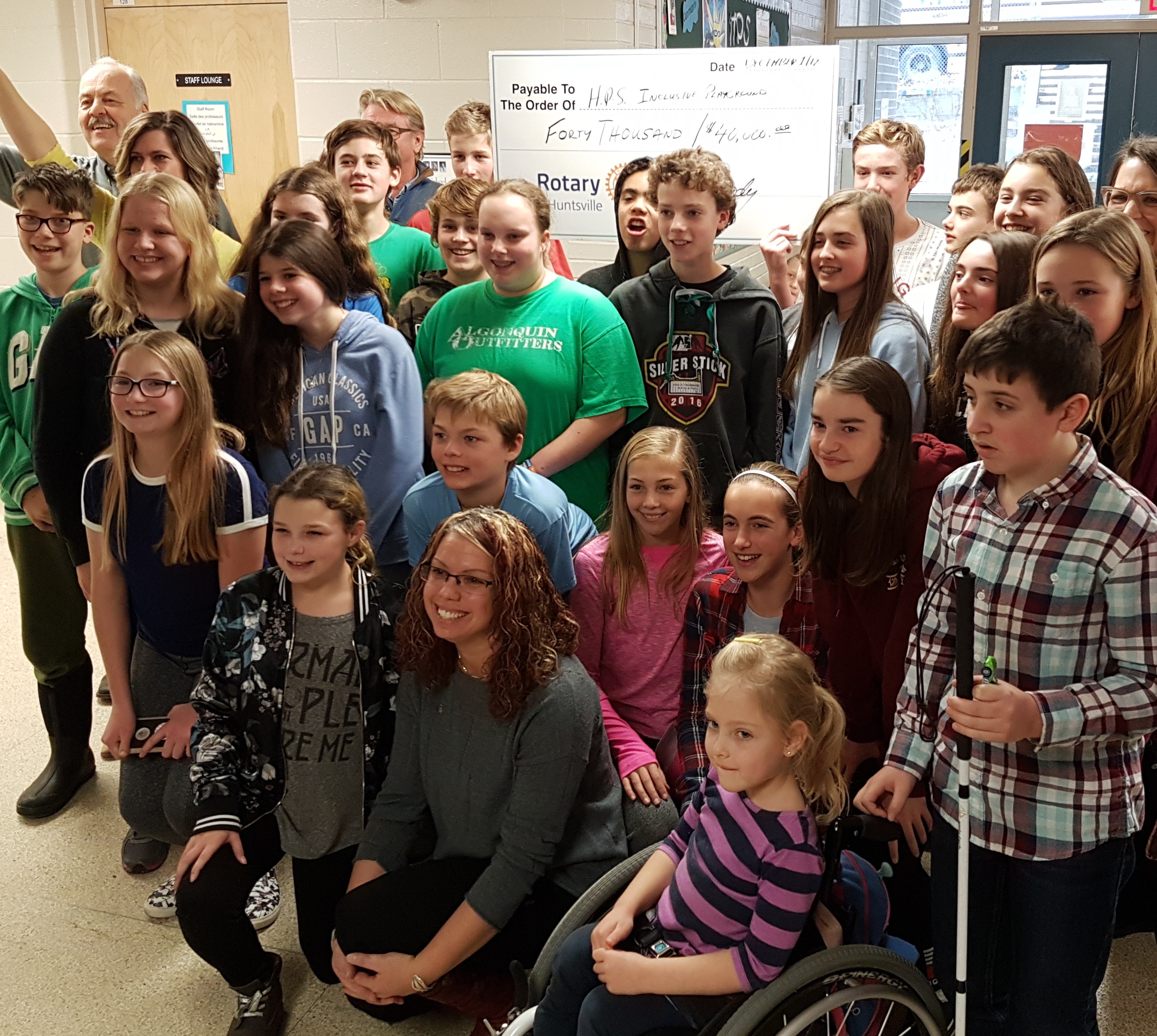 HPS students joined Rotarians with the $40,000 cheque donated by the club