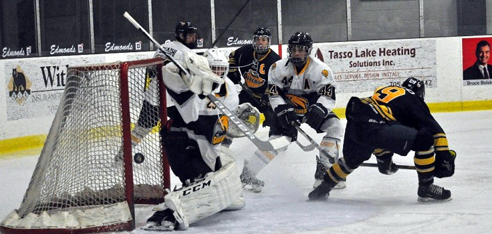 The Otters get the puck past the Hawks’ goaltender on their way to a 3-2 win