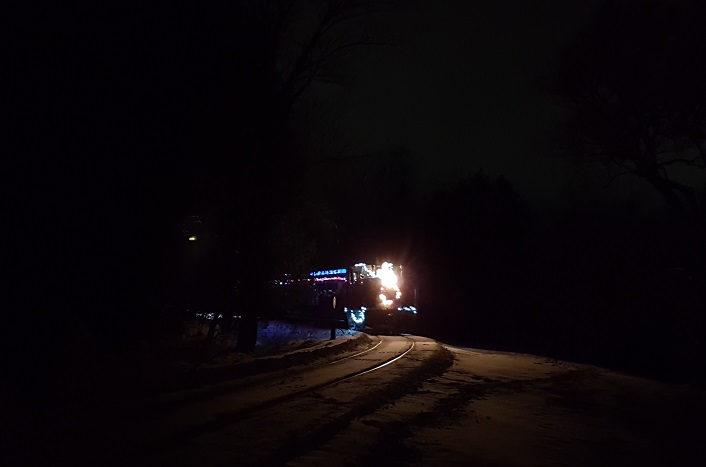 It's always a thrill to watch the Portage Flyer, decked out in Christmas lights, round the final bend on its way to the end of the line...and Santa!