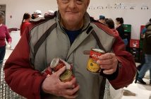 Audlee Tredgett helps sort donations
