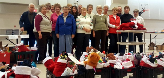 Faith Baptist church volunteers fill 300 stockings for kids this year