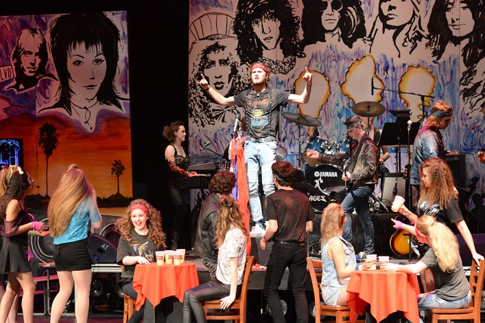 Couper Ebbs-Picken (on stage at back)  as Lonny Barnett (Photo: Wilf McQuinn)