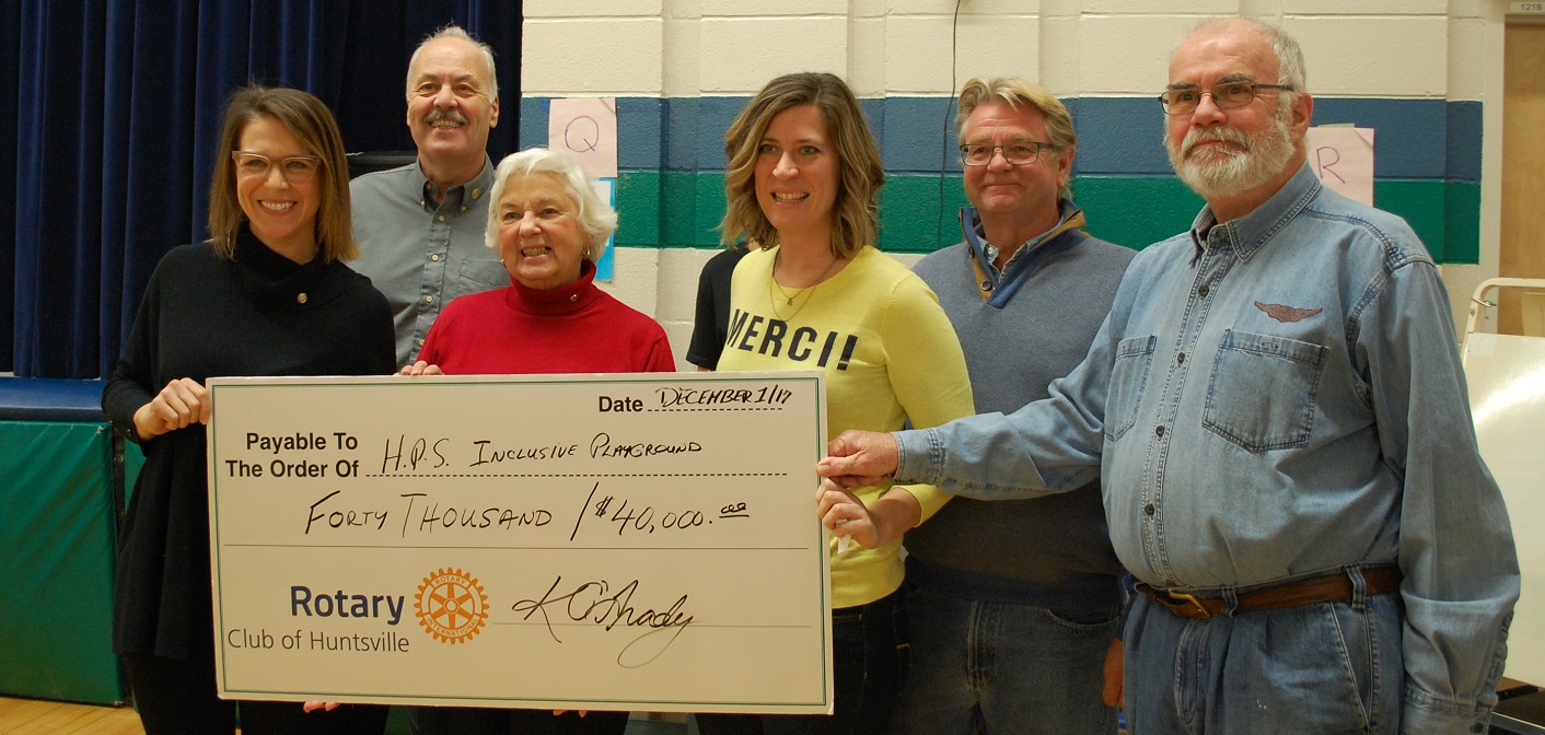 HPS teacher Kerri-Lynne Knappett (third from right) accepts a cheque from Rotarians (from left) Kim O’Grady, Lea Barker, Barbara White, Jamie Thompson and Ross Kirwin