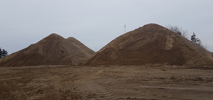 All of the sand in these piles of sand (and more) will all be used on Huntsville's roads this winter