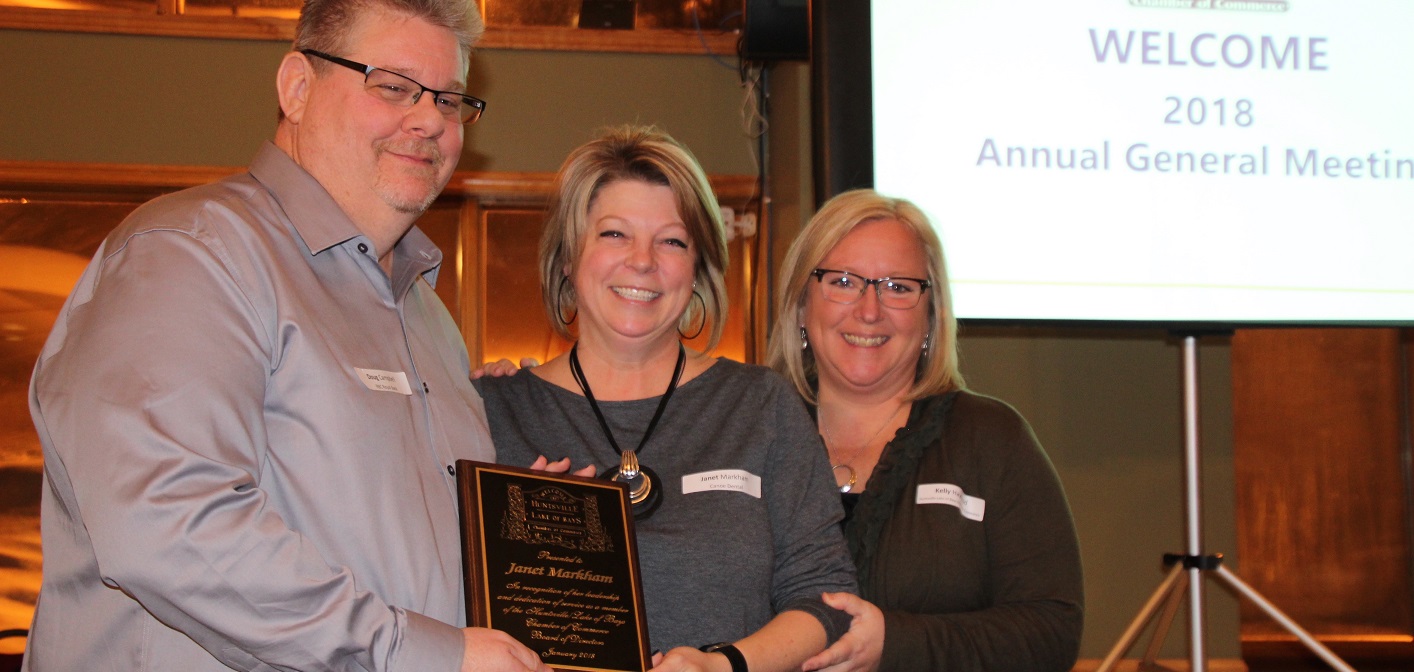 Outgoing director Janet Markham, who served four years on the Chamber, is thanked by Doug Campbell and Kelly Haywood for her contributions