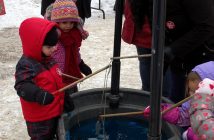The Fish Pond drew giggles from these young fishers when they snagged a catch