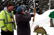 Karen Henkelman learns about archery from Gord Shields of Archers of Muskoka