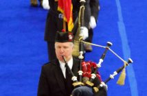 Cameron Renwick of Cameron of Lochiel Pipes and Drums pipes the OPP colour guard and dignitaries out of the Don Lough Arena (Photo: Dawn Huddlestone)