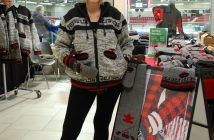 Catherine Cole of The Great Vine shows off fair trade curling sweaters, scarves, hats and mitts from Newmarket-based ARK (Photo: Dawn Huddlestone)