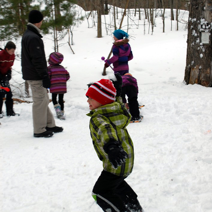 Walter Finch winds up to launch a snowball at his brother