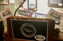 The podium displayed this year's theme "Good Governance: It Takes a Village"