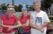 Rob Saunders with Suzanne Riverin (left) and Sharon Stock Feren at Art Splash, a children's arts and craft day