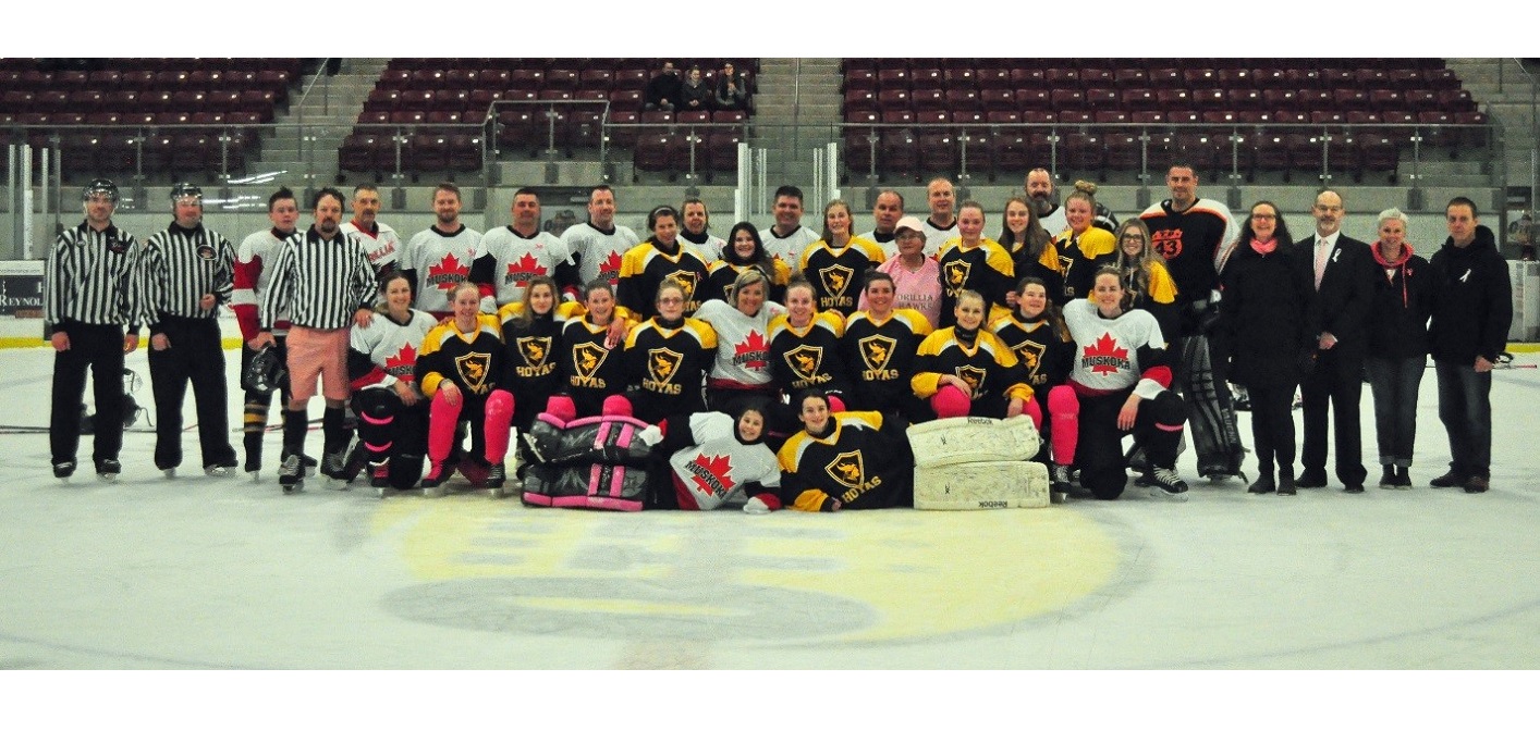 The Hoyas girls hockey team and the OPP gathered for a group photo post-game