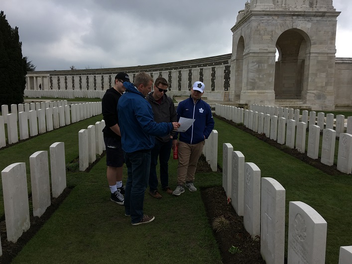 (From left) John Musselman, teacher Jeff Young, Ryan Taylor and Ethan Pontes at the Tyne Cot Cemetery in Belgium, the largest Commonwealth War Graves Commission cemetery in the world
