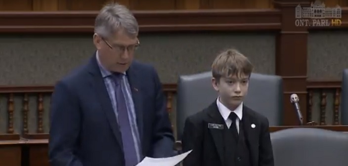 MPP Norm Miller reads a petition on April 9, calling on MAHC to commit to core services at both of Muskoka’s hospitals