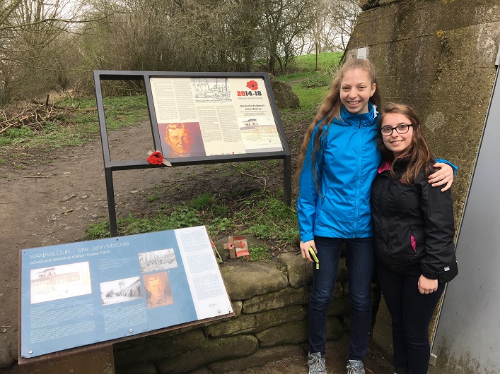 Victoria Langfeld and Charlotte Shakespeare at the John McCrae memorial. McRae wrote the poem In Flanders Fields. (supplied photo)