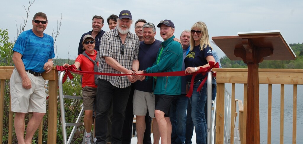 Among those celebrating the grand opening of the Hunters Bay Trail extension were trail advocates Steve Alcock (in front, third from left) and Don McCormick (in front, second from right), Mayor Scott Aitchison (in front, third from right), The Great Trail’s VP of Resources Simone Hicken (right), and members of Huntsville Council