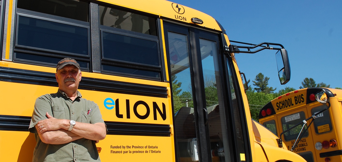 Driver Stan Latour with Campbell Bus Lines’ new electric bus