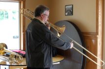 Trombone player from the Muskoka Concert Band in rehearsal at the Utterson Community Centre
