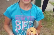 Emily Parry is all smiles after receiving a cookie medal (Photo: Angela Deemert)