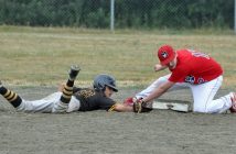 Zack Boese reaches for the base in a slide