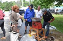 Ron Bowman brought out his 1940s oat roller from Quebec., which caused a lot of curiosity.