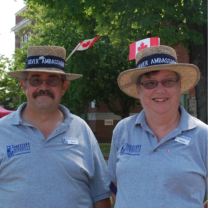 Downtown BIA Silver Ambassadors Peter (left) and Irene Redwood help answer questions for Canada Day visitors