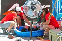 Cool water and ice help to bring down athlete temperatures on a hot day