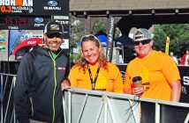 (From left) Ironman 70.3 Muskoka race director Nick Stoehr and finish line volunteer captains Kari Lambe and Dorothy Richardson