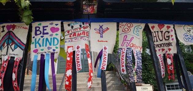 Peace flag hanging at Town Hall a response to the question ‘How will I change?’