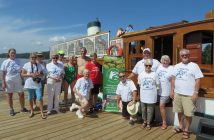 Glenn with supporters and the SS Bigwin at Dwight public dock on August 2 (Photo via Lake of Bays Shoreline Preservation Project/Facebook)