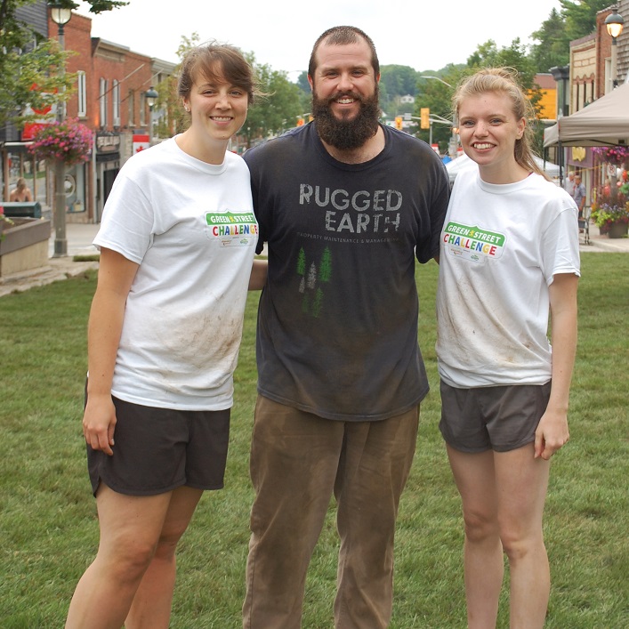 Sean Christie from Rugged Earth (centre) with the Downtown Huntsville BIA's Morgan Richter (left) and Lizzie Robinson
