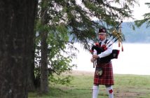 An early morning treat for the paddlers as they are piped in by bagpiper Brian Raaflaub.