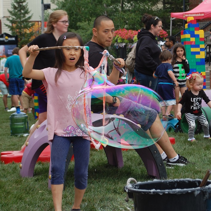 Cynthia Gim from Toronto was amazed by the giant bubbles she could make