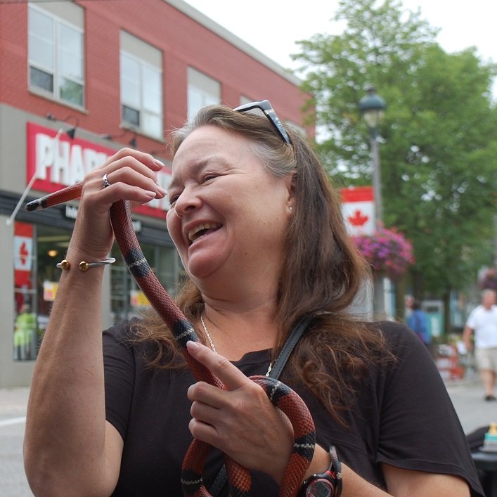 Brenda Brown got up close and personal with a milk snake at the Elephant Thoughts educational display