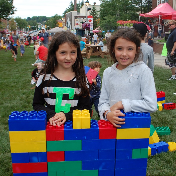 Kaylee (left) and Marissa Blain from Woodstock had fun building with great big LEGOs