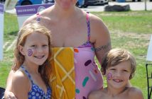The MacDonald family (from left) Piper, Karrie, and Lochlin swam in memory of loved ones