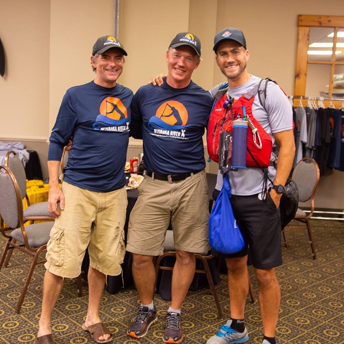 Co-organizers Rob Horton, left, and Mike Varieur, centre, with an AOMRX competitor at registration (Photo: Randy Mitson)