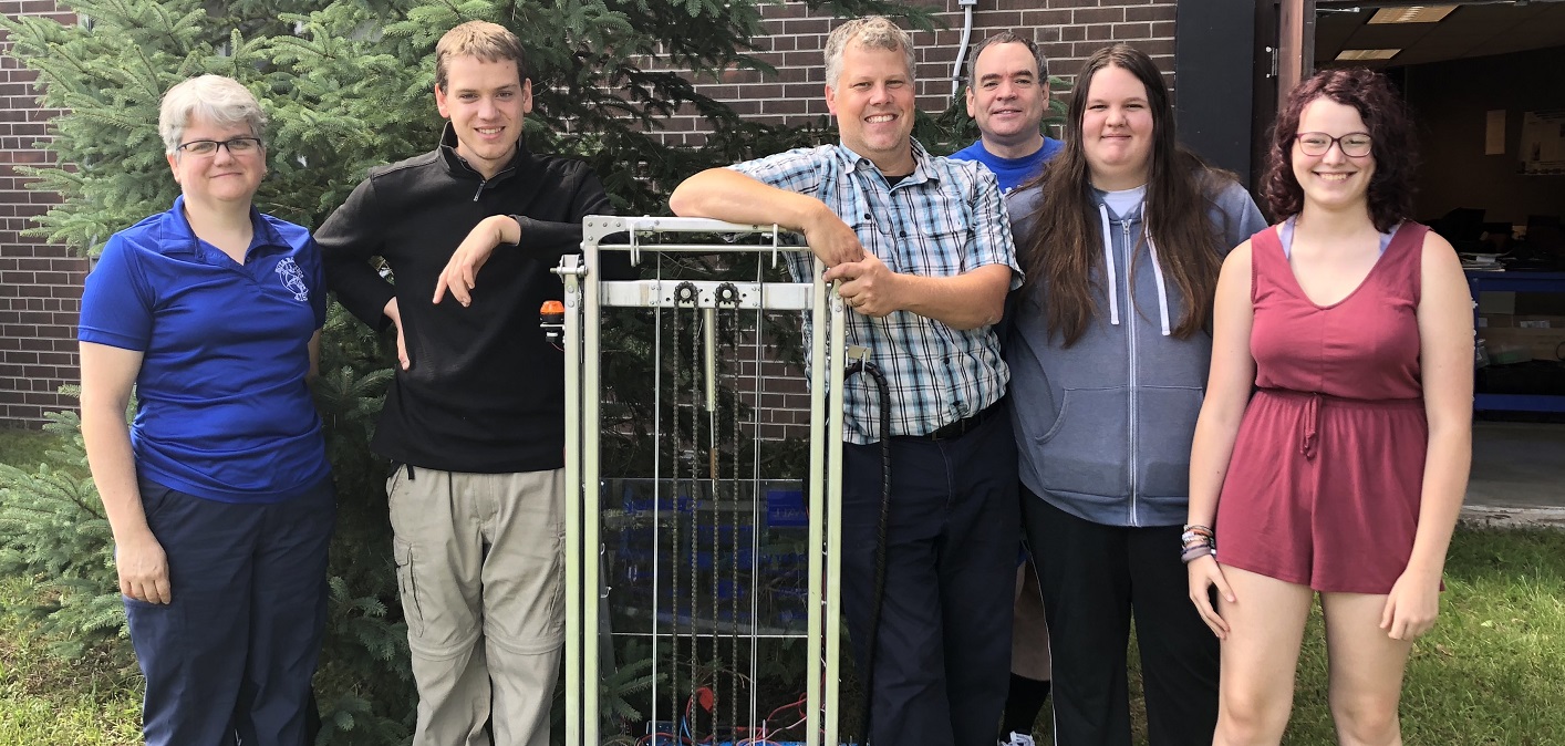 Hoya Robotics mentors and students (from left) Nancy Topps, Sam Topps, Ian Mctavish, David Topps, Amber Daultrey, Kira Brisebois