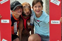 Beckett and Islette Greib with Juno the dog
