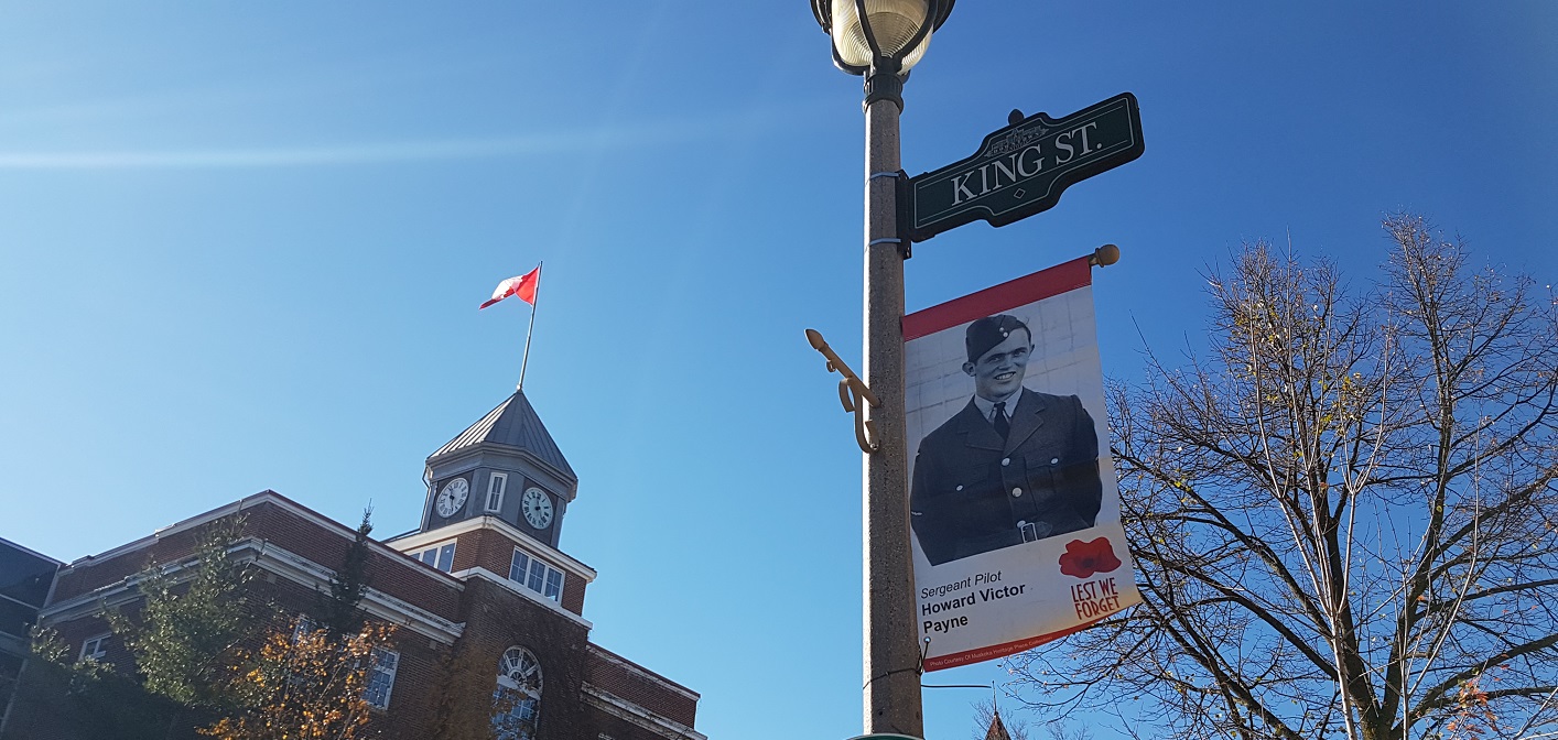 Eighteen banners hanging along Huntsville’s Main Street commemorate fallen WWII soldiers