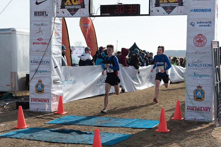 Cameron Heinz (right) crosses the finish line (Photo: Peter Stokes)