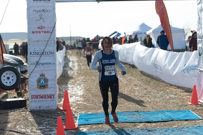 Jennifer Nicholson crosses the finish line (Photo: Peter Stokes)