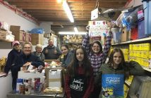 The Riverside Me to We team delivers food to The Table Soup Kitchen food bank