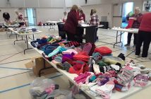 On 'processing day', the Faith Baptist Church gymnasium is a busy place