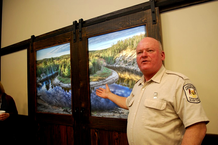 The door to the warming centre displays a photo of the Big Bend by local photographer Rob Stimpson