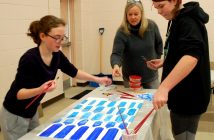 Rhianna Secord (left) and Phoebe Kujala (right) from Pine Glen Public School with artist Helena Renwick